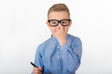 boy in glasses with a pen in a white isolated background