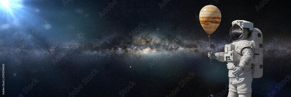 Wall mural astronaut with planet jupiter balloon, background banner with empty space