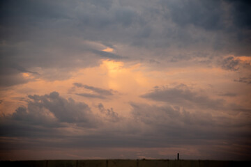 Landscape and clouds at sunset in rural area in autumn in southern Brazil.NEF