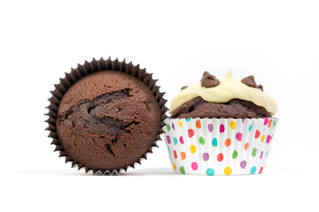 Chocolate cupcake/muffin in spotty cake case shot against white background
