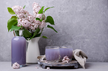 Lilac drink in a glass