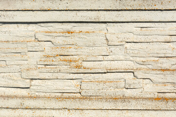 white concrete texture. Old concrete fence made of blocks.