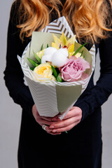 Bouquet of flowers in pistachio package
