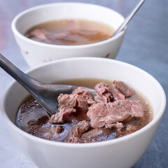 Beef soup - famous food in Taiwan, Asia, Asian Taiwanese street delicacy cuisine, close up, lifestyles, traditional breakfast in Tainan.