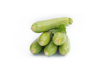 Young fresh green marrows on a white background