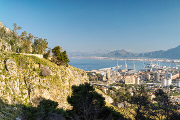 Panoramic view over the sea and port with cityscape from Monte Pellegrino on a beautiful sunny day in Palermo, Sicily, Southern Italy