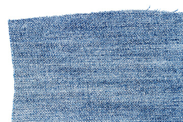 Piece of light blue jeans fabric