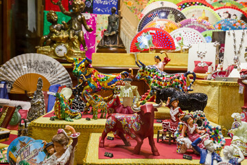 Showcase of souvenir shop for tourists in Seville, Spain.