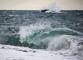 waves breaking on the rocks
