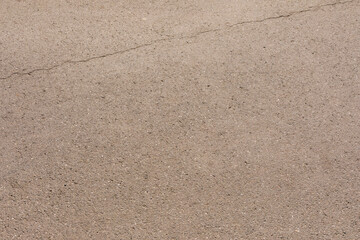 Background of light brown asphalt in the city.