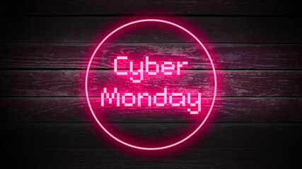 Fototapeta na wymiar CYBER MONDAY in neon style on wooden background for your design template.