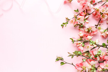 Obraz na płótnie Canvas postcard mockup. flower composition. floral frame of pink flowers. flowering branch of azalea. space for text. congratulation. invitation