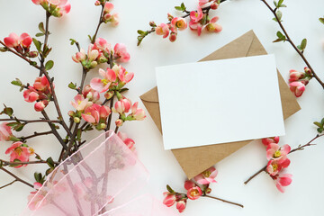 postcard mockup. flower composition. floral frame of pink flowers. flowering branch of azalea. space for text. congratulation. invitation