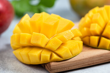 Fresh Mango Half Cut In Cubes. Juicy Tropical Fruit