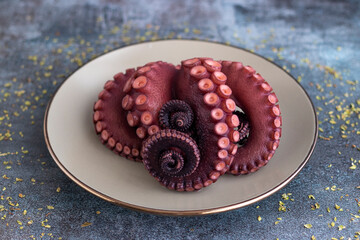 Delicious octopus tentacles served on a fine plate © Erik González