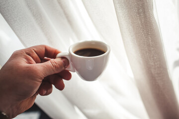 delicious aromatic coffee, in a cup, beans, natural, ground