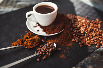 delicious aromatic coffee, in a cup, beans, natural, ground