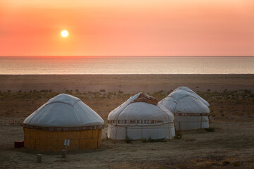 Three yurts on the shore of the Aral Sea, Karakalpakstan
