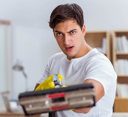 Man husband cleaning the house helping wife