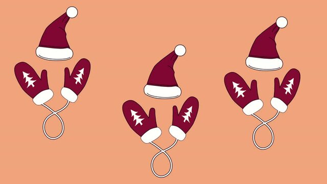 Funny background. Christmas and New Year celebration concept. Red Santa hat and gloves dancing on pink background. Copy space