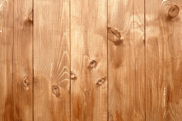 Obraz premium Texture of Brown wooden boards with knots.