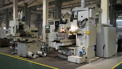 Metalworking milling machine. Produces metal detail in a factory. Machine tools for metal working. A metal workpiece is machined by an electric machine. Cutting metal modern processing technology