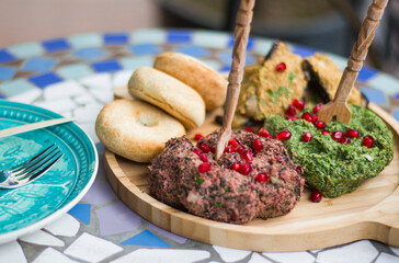 Georgian traditional food Pkhali, meal and dish with vegetables and pomegranates.