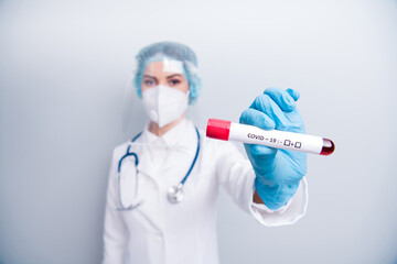 Closeup photo of virology doc clinic hold blood probe tube sick ill patient positive covid result...