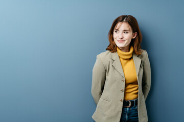 Young woman looking aside with amusement