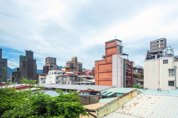 Naklejka premium TAIPEI, TAIWAN - July 2, 2019: view of Buildings around Taipei, Taiwan