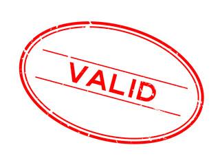 Grunge red valid word oval rubber seal stamp on white background