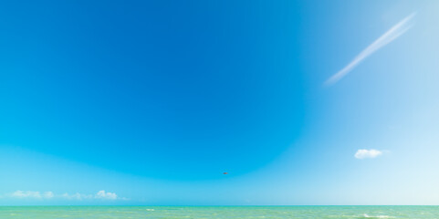 Fototapeta na wymiar Turquoise water in Higgs Beach pier under a blue sky