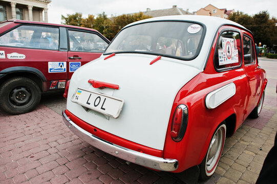 Tarnopol, Ukraine - October 09, 2016: Classic Retro Car Dual Color White & Red  ZAZ Zaporozhets 965 Designed And Built From 1960-1963, With License Plate LOL