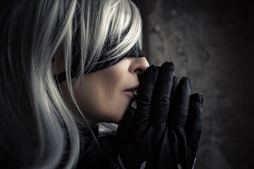 profile face woman in white wig and black blindfold, cosplay