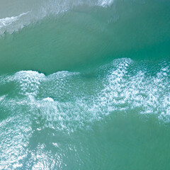 Ocean Waves Rolling In Shot From Above