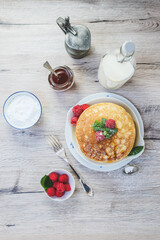 top view of breakfast table with stacked pancakes