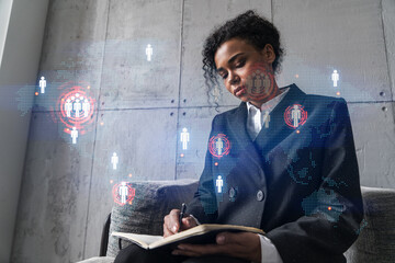 Businesswoman taking notes and world map hologram. Double exposure. Technology security network...