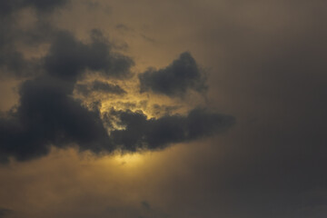 Thunderclouds on a gray sky. Beautiful background