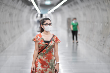 young Asian girl wearing Surgical face mask protect coronavirus inflection, Happy tourist woman ...