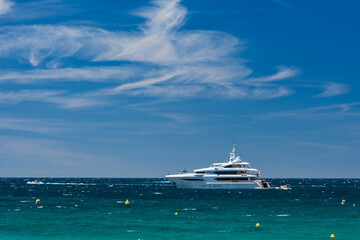 View of a big yacht from the city of Cannes, France