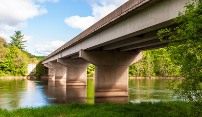 A bridge over the Allegheny River on State Route 62 in Warren County, Pennsylvania, USA on a sunny...
