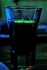 Glass with cold liquor under contrast light