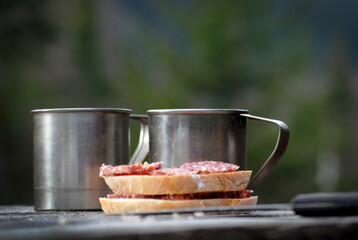 mugs of tea and sandwiches