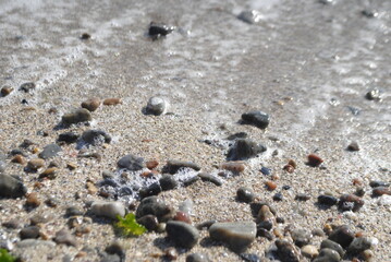 Fototapeta na wymiar Little sea rocks on the beach