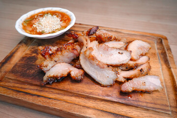 traditional Thai culture fried pork neck grilled intestines Chitterlings cuisine air fryer or moo tod yang box set famous street 
fast foods menu at thailand hot spicy sauces on wood sticky rice