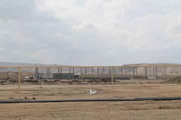 Fototapeta premium Oil pipes in a petrochemical plant during the production of oil and gas