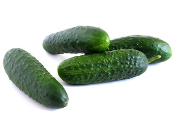 Cucumbers on a white background. Suitable for mockups and backgrounds. Cooking. Vegetables.