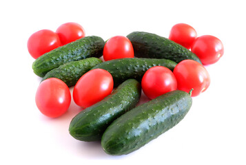 Set of vegetables: cucumbers, tomatoes, peppers, zucchini on a white background. Suitable for mockups and backgrounds. Food preparation. Vegetables.