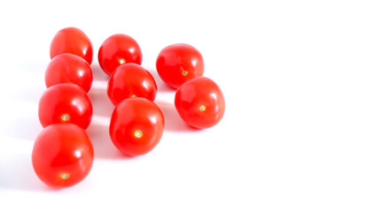 Red tomatoes on a white background. Suitable for mockups and backgrounds. Cooking. Vegetables.