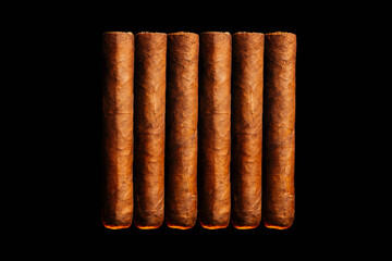 A vertical look of fresh hand-cooked new cigars.concept of a businessman's rich leisure